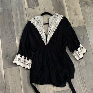 Black and ivory lace romper with bell sleeves!